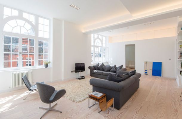Open plan lounge natural lighting cast iron old school radiators covent garden