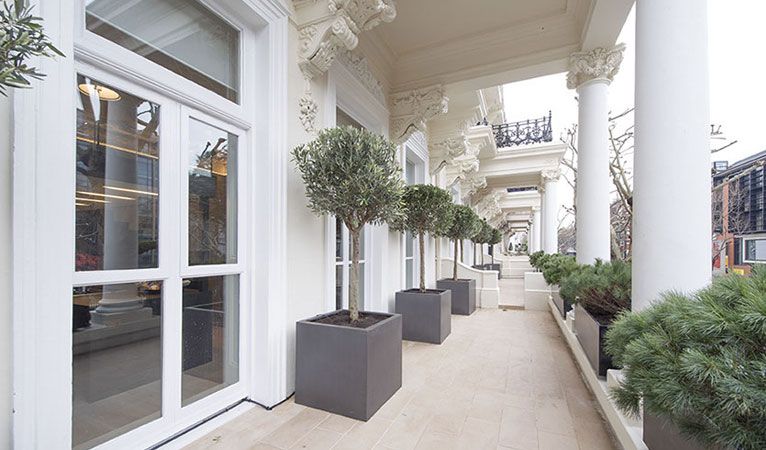Remarkable Portland stone terrace/patio on the front of this delightful Kensington apartment