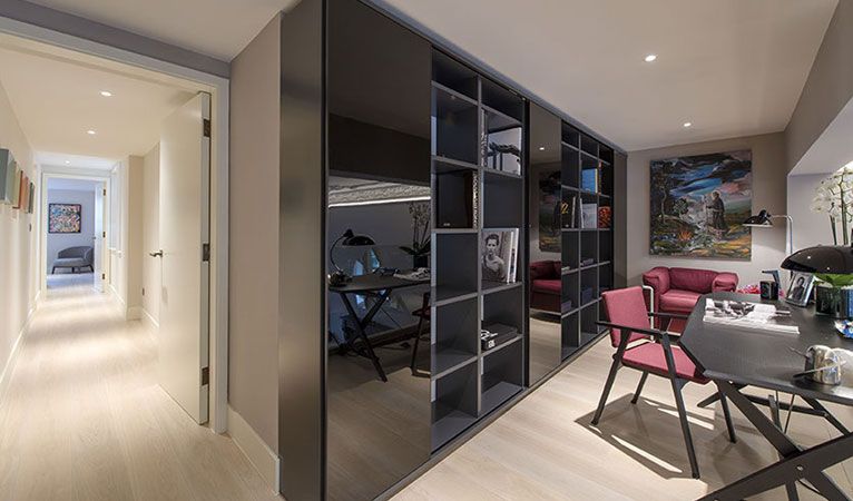 Mezzane level Study & Hallway, Oak flooring & high gloss bespoke units in Kensington SW7