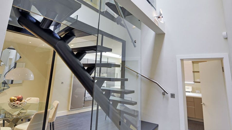 custom-made-self-supporting-staircase-with-ebonised-oak-hardwood-floating-treads-chelsea
