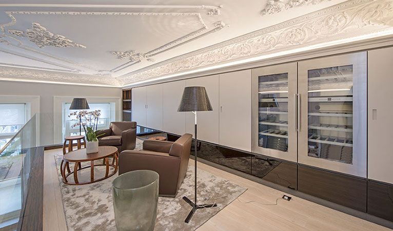 Mezzanine Cigar Lounge with sub-zero wine coolers in Kensington SW7